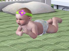 a baby in diapers is laying on the floor