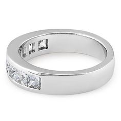 Top of ring height: 5.1mm

Band width: 4.6mm

Shank width: 4.2mm



Stone material: clear cubic zirconia

Stone shape: square

Total number of CZ stones: 8

Stone setting: channel setting



Metal: 925 sterling silver

Plating: rhodium plated

Finish: high polish Asscher Cut Channel Set Promise Ring, Modern Cubic Zirconia Eternity Band For Anniversary, Modern Princess Cut Ring In Cubic Zirconia, Silver Asscher Cut Ring With Channel Set, Princess Cut Cubic Zirconia Ring Channel Set, Channel Set Diamond Rectangular Rings, Modern Cubic Zirconia Princess Cut Ring, Cubic Zirconia Princess Cut Ring With Tension Setting, Modern Cubic Zirconia Diamond Ring With Square Cut