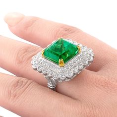 This Classy Emerald Lady's Ring features 21.90Gr with 12.15Ct Emerald and 4.20Ct Roudn Diamonds sets in 14K White Gold. Please call for availability. Luxury Green Halo Ring For Formal Occasions, Luxury Green Cluster Ring For Formal Occasions, Luxury Green Cluster Ring For Formal Events, Women Rings, Emerald, Diamonds, White Gold, Ring, Gold