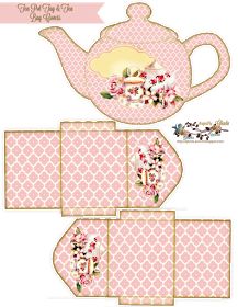 a pink teapot with flowers on it and two matching placemats, one for the