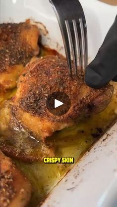 someone is using a fork to eat some food in a bowl with the words crispy skin on it