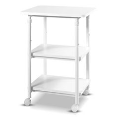 a white table with two shelves on wheels