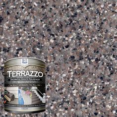 a can of terrazzo is sitting on the ground