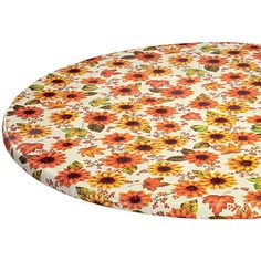 an orange and yellow sunflower print round tablecloth