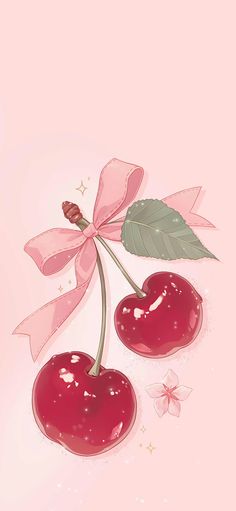 two cherries on a pink background with leaves