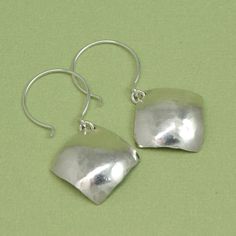 FREE SHIPPING with a purchase of $35 or more! Automatically deducted at checkout~ The sterling silver cadence earrings are hammered then domed into a convex diamond-shape to create shimmering sparkle seen from every direction! They hang about 1-1/2 inches (3.8 cm) from the top of the French hoop. Simple Silver Earrings, Silver Engraved Bracelet, Modern Silver Jewelry, Hammered Jewelry, Silver Jewelry Box, Fine Silver Jewelry, Necklace For Girlfriend, Earrings Diamond, Earrings Geometric