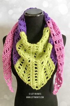 a crocheted scarf on top of a black mannequin with the words spring market mod scarf