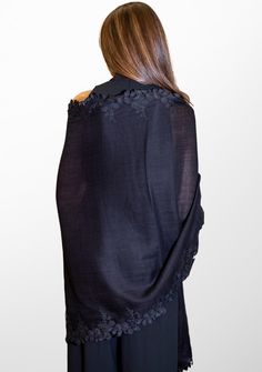 Woven from a fine silk and wool blend, this black scarf features a tonal black bold scalloped edging lace border. This chic and contemporary accessory keeps you stylishly warm. Formal Black Pashmina Shawl, Elegant Black Pashmina Shawl For Formal Occasions, Black Pashmina Shawl For Formal Occasions, Black Formal Pashmina Shawl, Elegant Black Shawl Scarves, Formal Black Shawl Scarves, Black Silk Shawl For Formal Occasions, Black Silk Formal Shawl, Elegant Black Lace Shawl