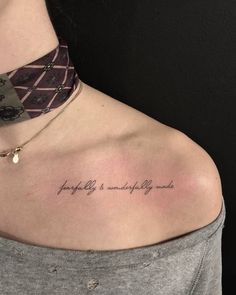 a woman with a tattoo on her shoulder that says, fragile is wonderfully made