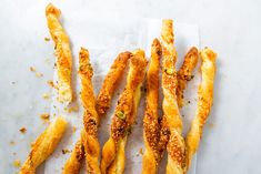 bread sticks with sesame seeds and seasoning on top