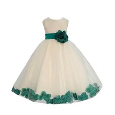 a white dress with green flowers on it