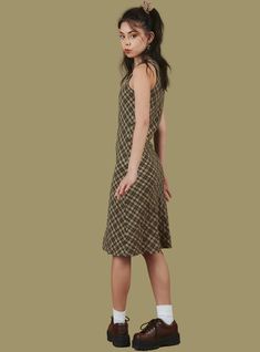 The Kelp Dress is a plaid tank dress cut on the bias. Material has a bit of stretch for a comfortable fit. Model is 5'7" and wearing a size S. 97% Polyester, 3% Spandex Imported SKU: UWD-1398 Green Mini Dress, Secret Sale, Green Plaid, Dress Cuts, Xl Dress, Tank Dress, Tshirt Dress, Comfort Fit, Short Sleeve Dresses