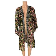 Brand: Vince Camuto Style: Kimono Color: Tropical Condition: New With Tags ****Missing Belt And Snag In Fabric (See Photos For Details)**** Material: 100% Polyester - Open Front - Ruffle Bottom Hem Tags: Shawl, Women's Coverup, Sheer Coverup, Floral Coverup, Maxi Coverup, Maxi Coverup, Long Coverup, Women's Kimono, Travel, Beach, Pool, Swim, Beachwear, Casual, Vacation, Tunic Fitted Open Front Beach Kimono, Fitted Open Front Kimono For Vacation, Beach Fitted Printed Kimono, Fitted Printed Kimono For The Beach, Casual Black Kimono For Day Out, Black Spring Kimono For Day Out, Black Kimono For Spring Day Out, Black Kimono For A Spring Day Out, Fitted Black Kimono For Beach