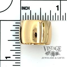 This exquisite ring band is made with 18 karat yellow gold and has an extra wide 14 mm width to make a bold statement. The low dome profile adds a gentle touch to the design, making the ring comfortable and elegant. Finger size 6.5. 18 karat, extra wide 14 mm width, low dome profile, ring band Finger size 6.5 Gold Wide Band Ring In Fine Jewelry Style, Luxury Wide Band Diamond Ring, Modern Yellow Gold Wide Band Ring, Formal Dome Ring With Open Band And Polished Finish, Timeless Yellow Gold Wide Band Ring, Luxury 14k Gold Wide Band Ring, Modern Dome Ring With Open Band For Formal Occasions, Modern Wide Band Ring For Anniversary, Luxury Wide Open Band Ring With Polished Finish