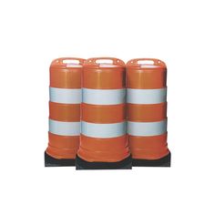 three orange and white traffic cones sitting next to each other