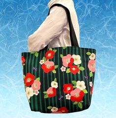 Japanese Camellia flower tote bag, This roomy bag is smart and remarkably spacious, making it a true go-anywhere, carry-everything bag. This durable shoulder bag is  soft, comfortable to carry your daily .... Ideal this purse for any situation.  [ Material] Fabric is Gorgeous and lovely Japanese Camellia flower print.  100% Cotton Brand: Kokka (Made in Japan)  Full lined with black cotton canvas. Approx Dimensions :  [Shoulder Bag] Width: 18 inches(46cm)  Height:12.5 inches(31.5cm)  Deep at the bottom: 6 inches (15cm) Strap :  Strap width 1.5" (3.5cm) Strap drop length: 12" (30.5cm) We have other bags and purses in this shop, you can find them here:  https://www.etsy.com/shop/SewEasyNewYork?ref=seller-platform-mcnav&section_id=19618681 This bag is Made to order item. Each Bag is made from Spring Rectangular Reversible Bag, Spring Reversible Rectangular Bag, Reversible Bags For Daily Use In Spring, Spring Reversible Bags For Daily Use, Large Green Shoulder Bag For Daily Use, Green Reversible Bag For Daily Use, Japanese Camellia, Flower Tote, Large Purse