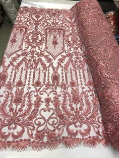 Pink Floral Embroidery Fabric For Wedding, Pink Wedding Fabric With Intricate Embroidery, Wedding Pink Fabric With Intricate Embroidery, Pink Lace Fabric With Intricate Embroidery, Embroidered Pink Fabric For Wedding, Wedding Embroidered Pink Fabric, Pink Embroidered Fabric With Pearl Detailing For Wedding, Festive Beaded Lace Embroidered Fabric, Traditional Pink Sequin Fabric For Wedding