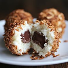 I made these Coconut Balls for the first time, and wow! My kids were so excited when they found the chocolate inside. They said it was like a yummy treasure! Can't wait to make them again! Link in first comment [👇] [👇] #Amazing #usa #sweetmemories #Easyrecipe #recipes