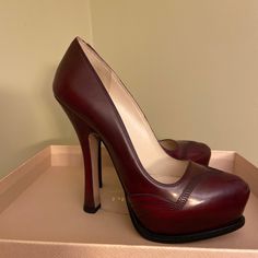 Never Worn Prada Heels In Maroon Leather With Oxford-Style Stitching On The Toe. Calf Leather Round Toe Heels With Red Sole, Calf Leather Heels With Red Sole And Round Toe, Designer Almond Toe Heels With Leather Lining, Luxury Burgundy Leather Heels, Burgundy Leather Heels With 4-inch Heel, Maroon Leather, Prada Shoes, Leather Heels, Shoes Women Heels