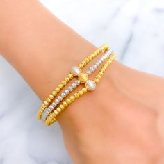 Complete your look with our refined two-tone bangle bracelet. Made from 22k yellow and white gold, this chic accessory has a gold weight of 22.4 grams. With a 2.5" diameter and round opening, it is adjustable with 0.5" links and features a secure lobster lock. PRODUCT DETAILS Gold Purity(karat): 22k Gold Weight(grams): 22.4 Item Finish: Yellow + White Gold Bangle Diameter: 2.5" Bangle Opening Shape: Round Adjustable Links: 0.5" Links Lock Style: Lobster Lock Adjustable Yellow Bangle, 22k Gold Bangles, White Gold Bangle, Lock Style, Gold Bangle Bracelet, Gold Bangle, Chic Accessories, 22k Gold, Gold Bangles