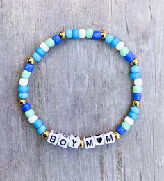 Boy Mama Bracelet / Boy Momma / Mom Bracelet / Boy Momma Bracelet / Mama Bracelet / Gift for Mom / Blue Mom Bracelet / Blue Beaded Bracelet - Etsy Adjustable Blue Name Bracelet With Colorful Beads, Blue Name Bracelet With Colorful Beads As Gift, Adjustable Personalized Turquoise Friendship Bracelets, Personalized Blue Bracelets For The Beach, Adjustable Blue Friendship Bracelets For Birthday, Blue Hypoallergenic Name Bracelet For Birthday, Handmade Blue Name Bracelet As Gift, Hypoallergenic Blue Name Bracelet For Birthday, Blue Charm Bracelet With Letter Beads