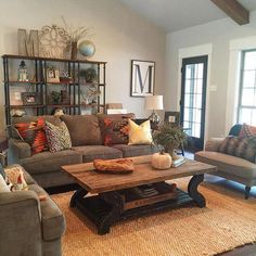 a living room filled with furniture and decor