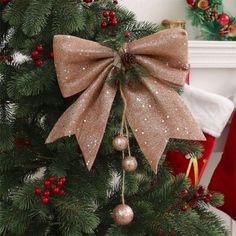 a christmas tree with a large bow on it