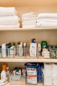 the shelves are filled with lots of toiletries