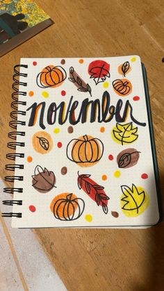 a notebook with the words november written on it