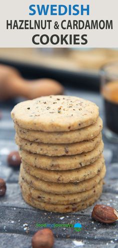 several cookies stacked on top of each other with the words swedish hazelnut and cardamom cookies