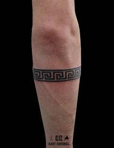 a person with a tattoo on their arm