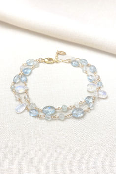 Aquamarine and moonstone beaded gemstone bracelet in gold fill Crystal Bead Jewelry, Moss Aquamarine, Aquamarine Bracelet, Layered Chain, The Lobster, Moonstone Bracelet, Gemstone Beaded Bracelets, Message Jewelry, Layered Bracelets