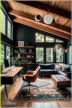 a living room filled with furniture and lots of windows