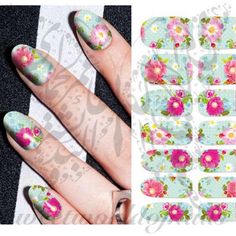 14 water decals.Use:1-Trim,clean then paint your nails with the color you want.2- cut out the pattern and plunge it into water for 10 - 20 seconds. (use warm water in winter).3- moisten the fingernails, stick the pattern in the position you like.4- sop up the water with a paper towel and blow dry.5- cap with clear nail polish and blow dry. Frozen Nails, Clear Nail, Floral Nail, Floral Nail Art, Clear Nail Polish, Art Water, Clear Nails, Floral Nails