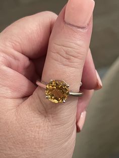 Namaste! See and feel the difference in our high end, boutique jewelry! Stunning 4.0CT citrine round classic .925 sterling silver ring size 8.5 Product Family: Anniversary/Engagement/Birthday/Confirmation/Communion Size: 8.5 Net Weight: 4.00 Grams (Including Gemstone & Silver) Main Stone: Citrine Base Metal: Sterling Silver, 925 parts per 1000 Metal Purity: 925 Stamped: Yes (925) Main Stone Creation: Natural Main Stone Size: 10x10 mm Brand: Desiregem Theme: Mixed Themes Metal: Sterling Silver Yellow Round Topaz Ring With Prong Setting, Formal Citrine Solitaire Birthstone Ring, Formal Solitaire Citrine Jewelry, Classic Yellow Citrine Birthstone Ring, Formal Citrine Solitaire Jewelry, Classic Round Topaz Birthstone Ring, Yellow Gold Sterling Silver Birthstone Ring, Classic Yellow Topaz Ring With Polished Finish, Classic Yellow Solitaire Topaz Ring