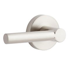 an image of a white door handle with round knobs on the outside of it