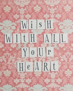 the words wish with all your heart are cut out on pink and white wallpaper