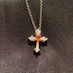 Orange Sapphire And Cambodian Zircon Are Set In Platinum Over Sterling Silver For A No Tarnish Finish In This Beautiful Cross Pendant Paired With A 20’ Stainless Steel Chain That Has Magnetic Closure. Tgw .48 And This Will Be Shipped In A Gift Box. Formal Orange Sterling Silver Necklace, Red Sterling Silver Cross Necklace, Red Cross Necklace In Sterling Silver, Cameo Choker Necklace, Brand Moodboard, Silver Jewlery, Orange Jewelry, Sapphire Necklace Pendants, Beautiful Gold Necklaces