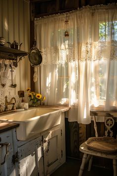 an old fashioned kitchen with sun shining through the window and curtains on the windowsill