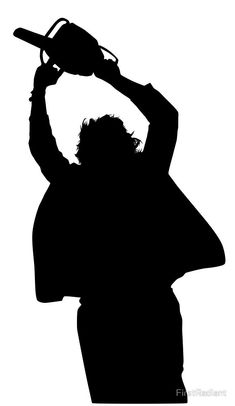 the silhouette of a man holding a baseball bat over his head