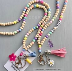 PASTEL SMILEY FACE PERSONALIZED LANYARD~ Stylish, fun breakaway lanyard featuring pastel rainbow beads accented with smiley face beads, paired with natural wood beads, strung on strong nylon cording with a swivel lobster clasp and key ring. (Please leave desired name/word(s) if you purchased personalization. Lightweight, so comfortable and easy to wear. Great gift idea ~ you won't find this original, unique lanyard anywhere else:) original list date: 7/1/22 PERSONALIZE ~ (no number or symbol bea Personalized Lanyards, Teacher Lanyard, Face Id, Rainbow Beads, Retractable Badge Reel, Letter Beads, Id Badge Holders, Id Badge, Pastel Rainbow