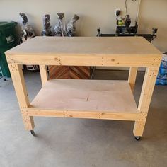 a workbench made out of plywood and wood