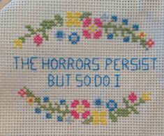 a cross stitch sample with the words, the horror's priest but 50 do i