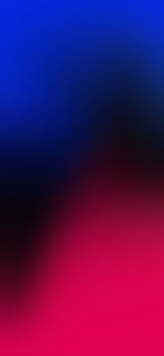 a blurry image of red and blue colors