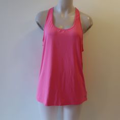 Nwt Womens Gapfit Neon Pink Perforated Back Activewear Racerback Tank Top L ** Size: Large Color: Neon Pink Scoop Neck Perforated Back Sleeveless Pullover Material: 92% Polyester 8% Spandex Measurements (Flat): Armpits: 19" Waist: 20" Length: 29" Nwt, New With Tags. ..Jnfr_gls_1121-4** Summer Gym T-back Tops, Casual Gap Activewear For Workout, Basic Scoop Neck Activewear For Summer, Basic Scoop Neck Summer Activewear, Summer Stretch Activewear By Gap, Gap Activewear For Workout With Go-dry Technology, Gap Go-dry Activewear For Workout, Fitted Gap Activewear For Sports, Gap Moisture-wicking Activewear For Workout