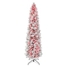 a red and white christmas tree on a stand