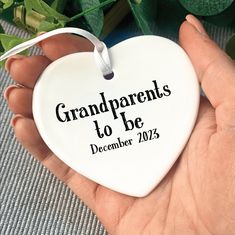 A ceramic hanging decoration to announce your pregnancy to your friends and family. This personalised pregnancy announcement ceramic decoration is the perfect way of announcing your pregnancy to the future grandparents! The personalised grandparent to be decoration can be personalised with the grandparent title of your choice. Eg. Granny, Grandad, Grandpa, Nanna, Nanny, Grumps etc as well as the month and year of your choice. This personalised pregnancy announcement gift is a lovely and memorabl Grandpa To Be, Grandparents To Be, Alphabet Gifts, Ceramic Decoration, Pregnancy Announcement Gifts, Personalized Ribbon, Ceramic Heart, To The Future, Small Decor