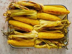 corn on the cob in a metal tray