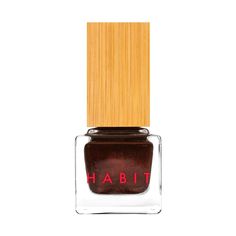 What is it? Voodoo is a deepened brownish red with bronze shimmer. Just like its inspiration Marie Laveau, it’s destined to enchant you with its spell. Why you'll love it: A healthier Habit, our polish is made with a vegan, cruelty-free, toxin-free formula and infused with Myrrh extract to improve nail strength Guilt-free packaging: Habit polish is the only polish packaged with recycled plastic components, biodegradeable bamboo overcaps to keep plastic use to a minimum, and FSC-certified paperbo Strengthening Nail Polish, Indie Makeup Brands, Marie Laveau, Cruelty Free Nail Polish, Indie Makeup, Vegan Nail Polish, Vegan Cosmetics, Toenail Polish, Red Nail Polish