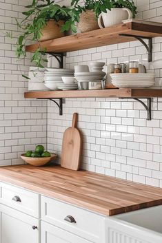 the shelves in this kitchen are filled with plates and bowls